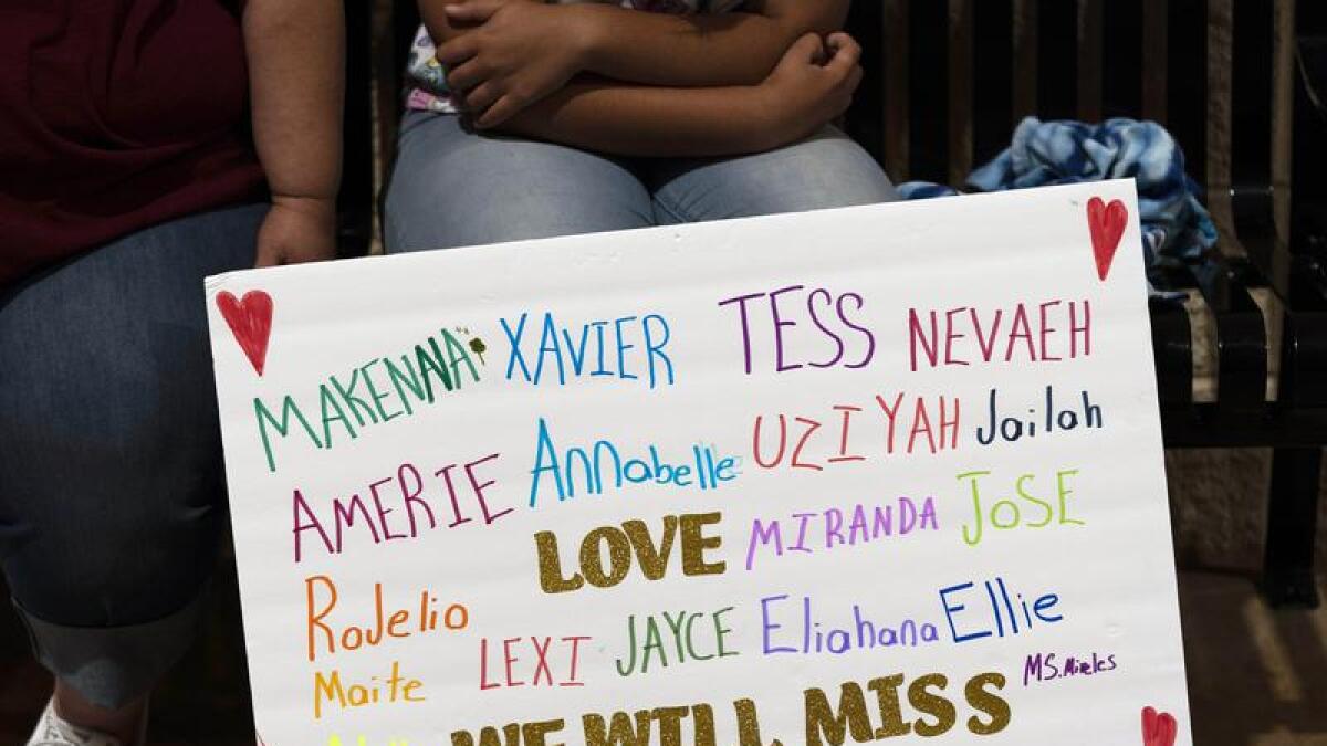 Sign bearing names of the Robb Elementary School shooting victims