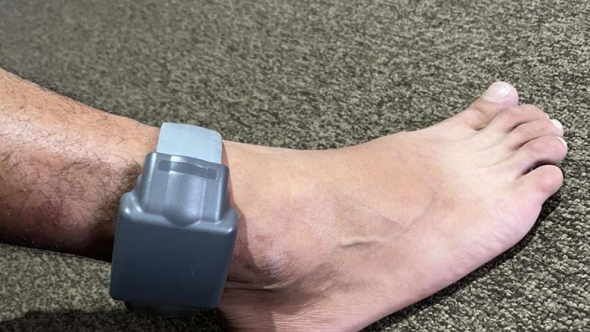 An electronic monitoring ankle bracelet