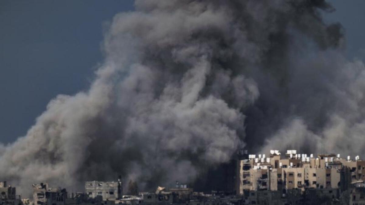 Smoke rises to the sky following an explosion in the Gaza Strip