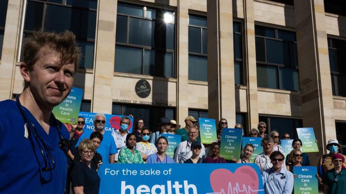 Doctors and supporters at WA parliament rally against new gas projects