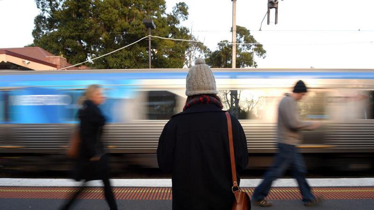 Commuters at a Melbourne train station