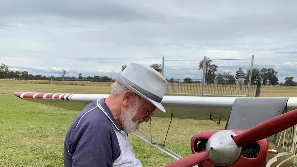 Maintenance: A Wangaratta Aero Club member  working on his model plane.