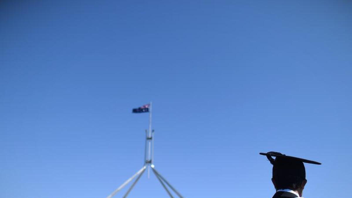 A university graduate outside Parliament House