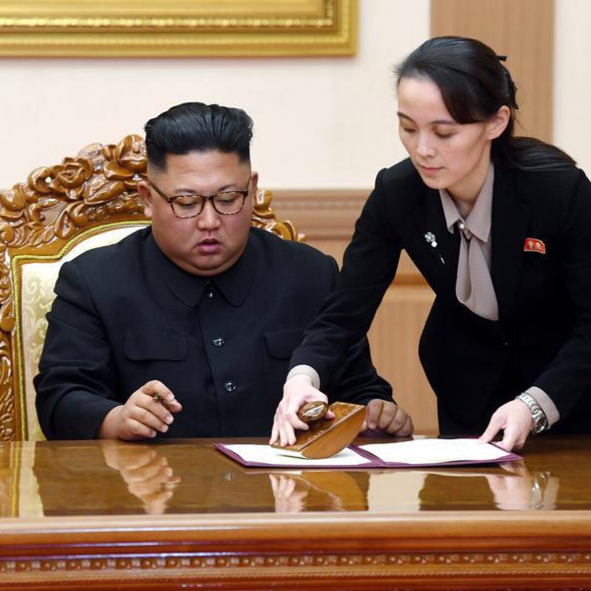 North Korean leader Kim Jong-un (l) with his sister Kim Yo-jong.
