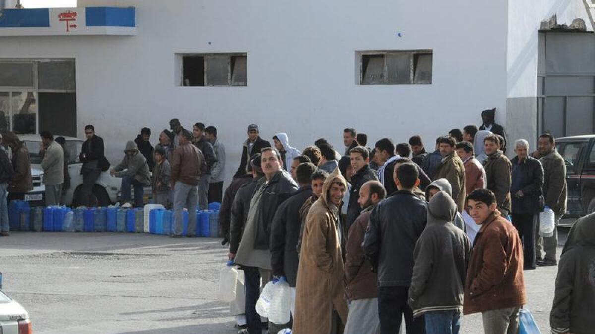 People line up for fuel in Libya.