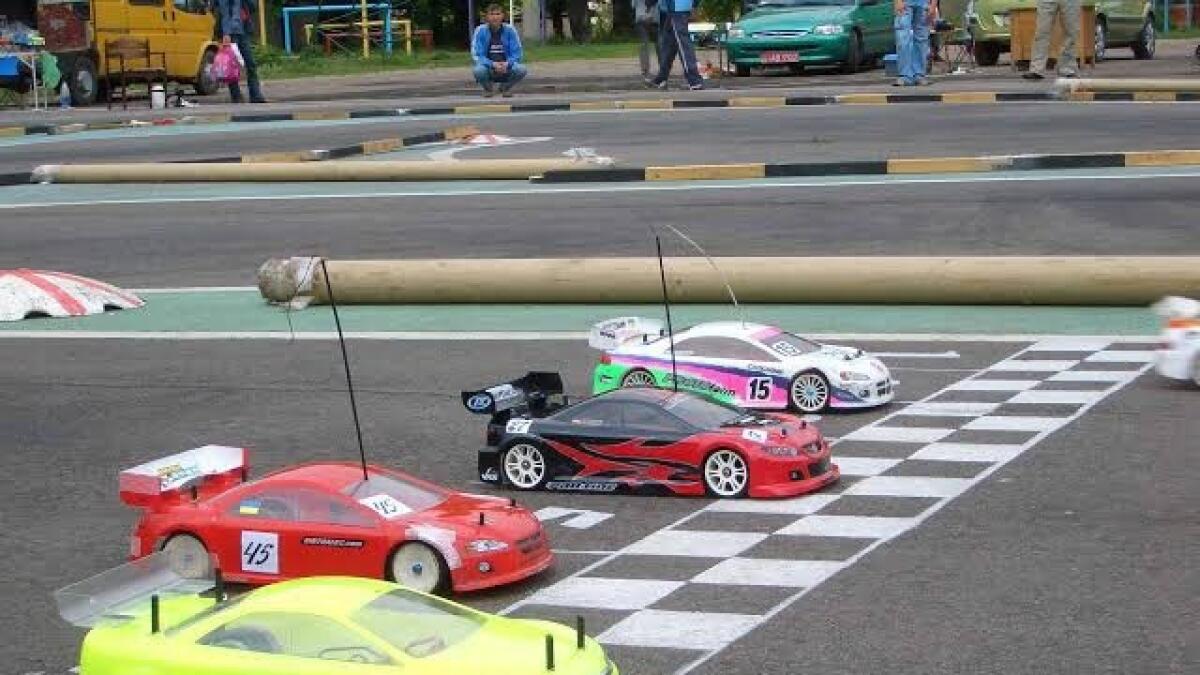 Photo finish: North East Radio Control Car Club models cross the finish line at a recent race.