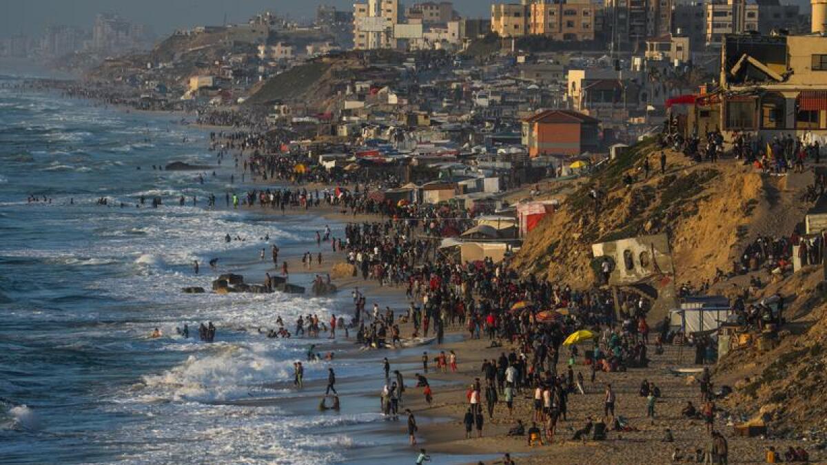 Gazans at a beach in the south