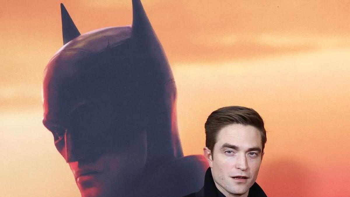 Robert Pattinson poses at the world premiere of The Batman in 2022