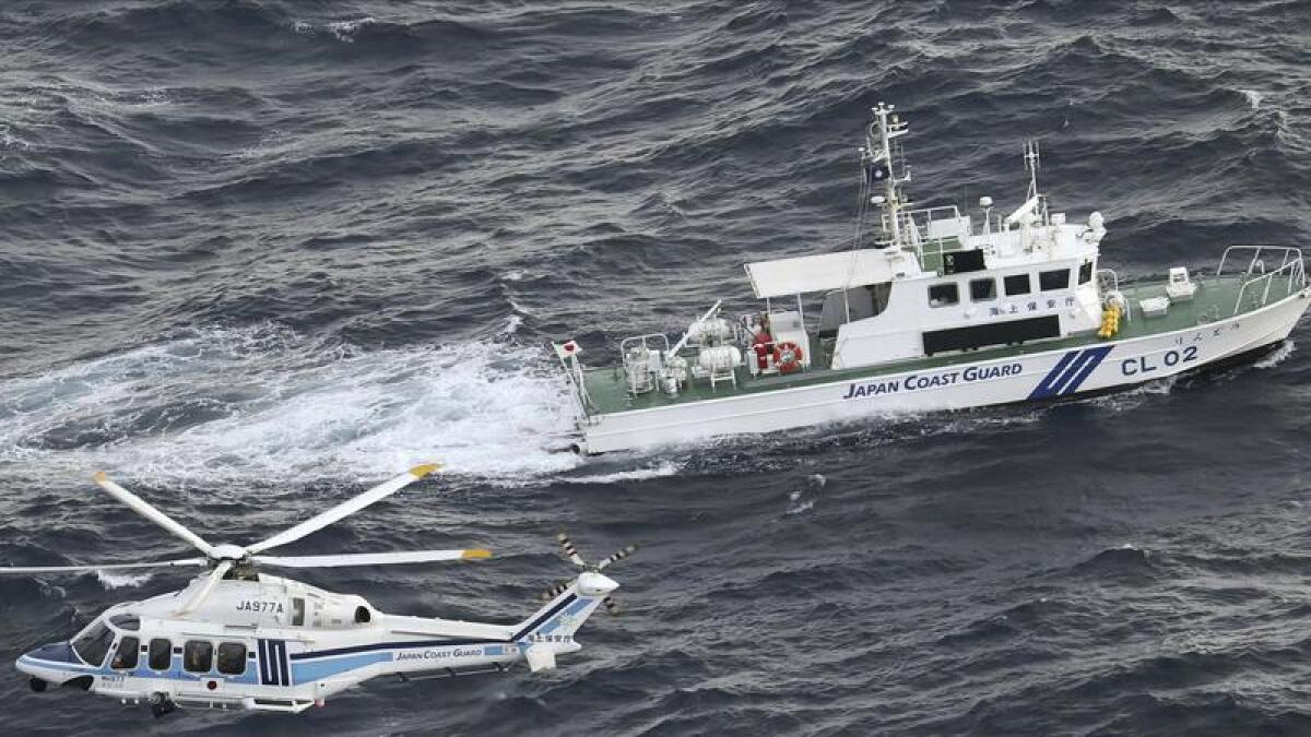 The Japanese coast guard search in the area where an Osprey crashed