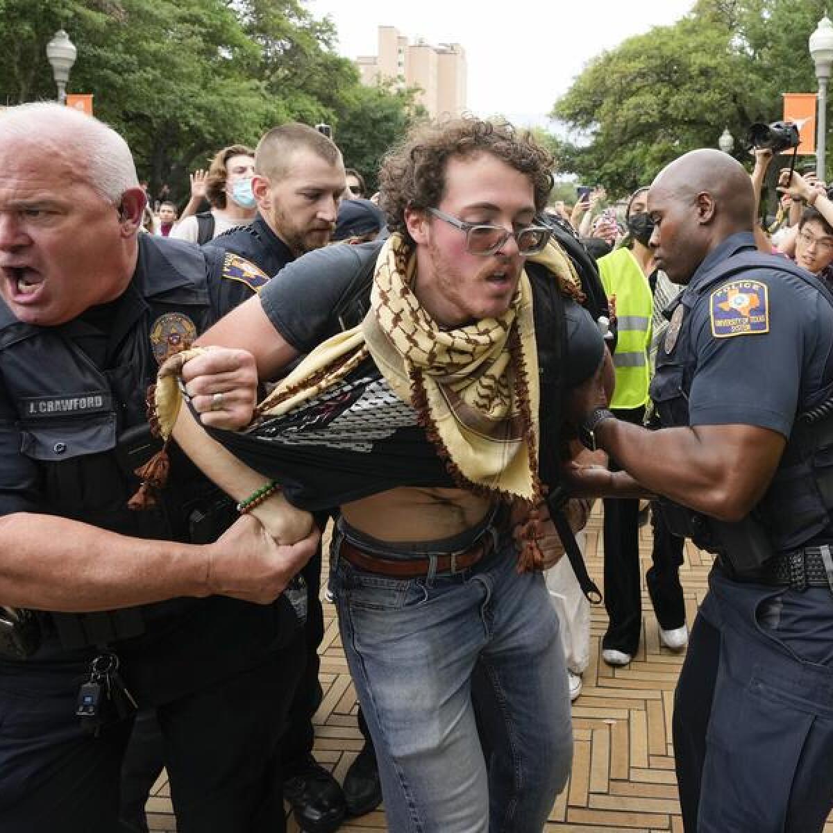 University of Texas police officers arrest a pro-Palestinian protester