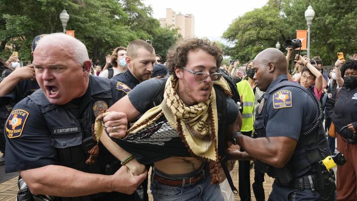 University of Texas police officers arrest a pro-Palestinian protester