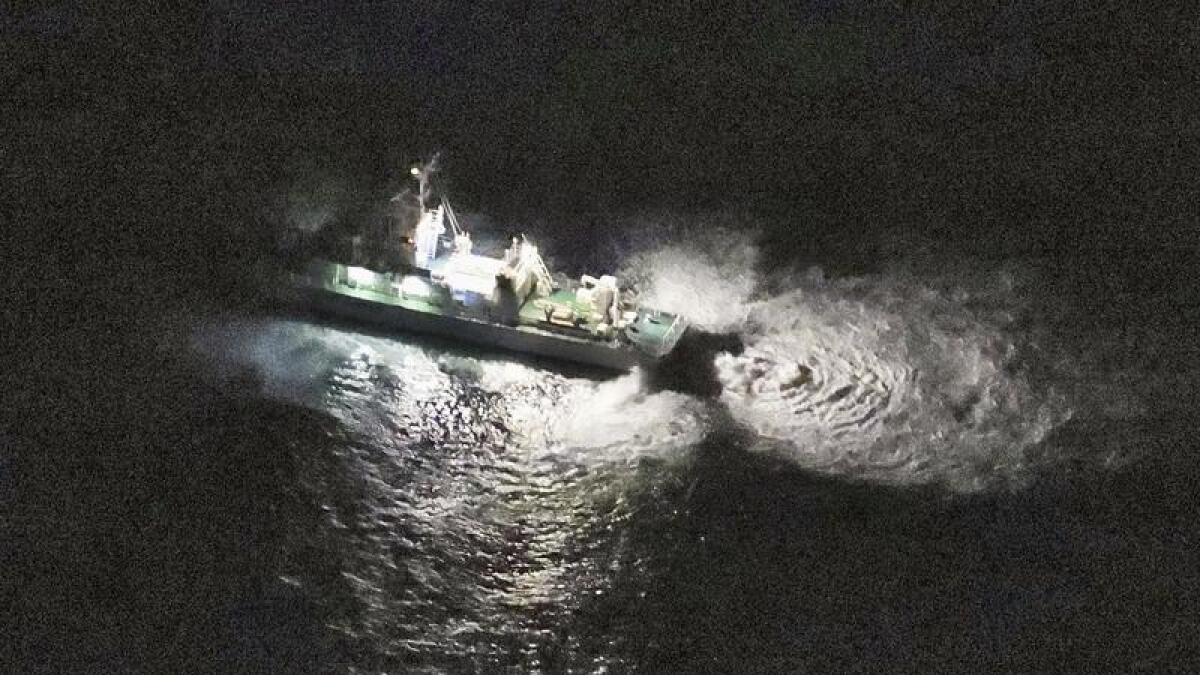 A Japanese coast guard vessel searches off Yakushima Island