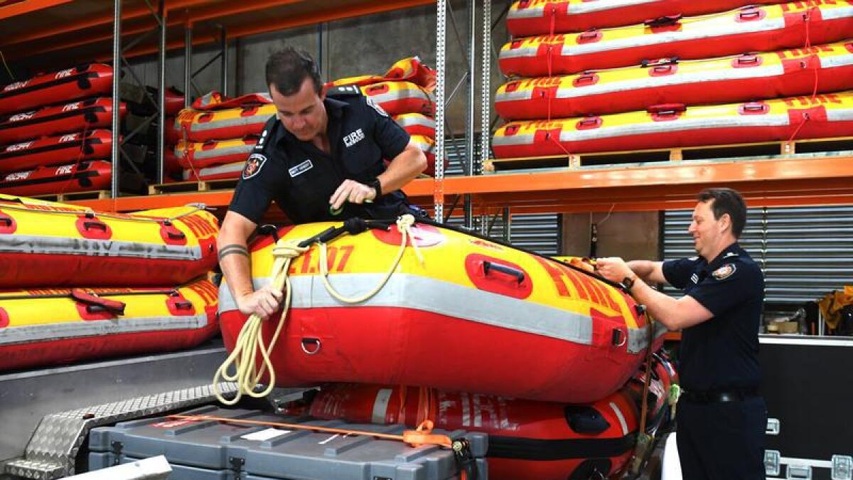 Fire and Rescue officers prepare swift water rescue