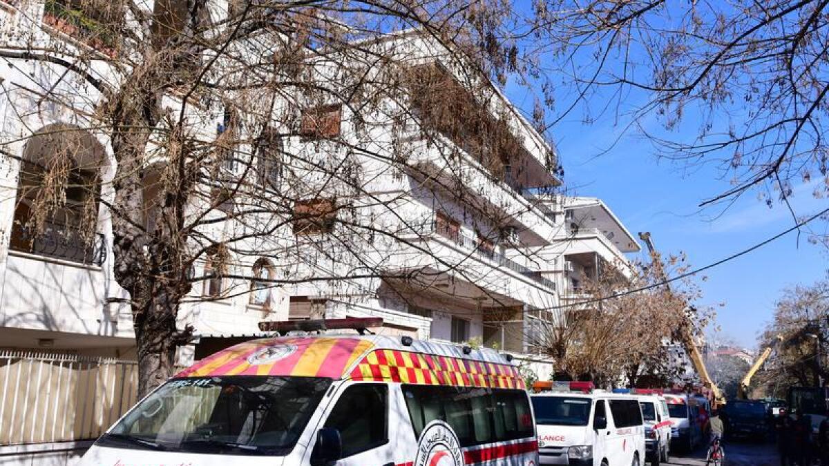 A file photo of ambulances in Damascus 
