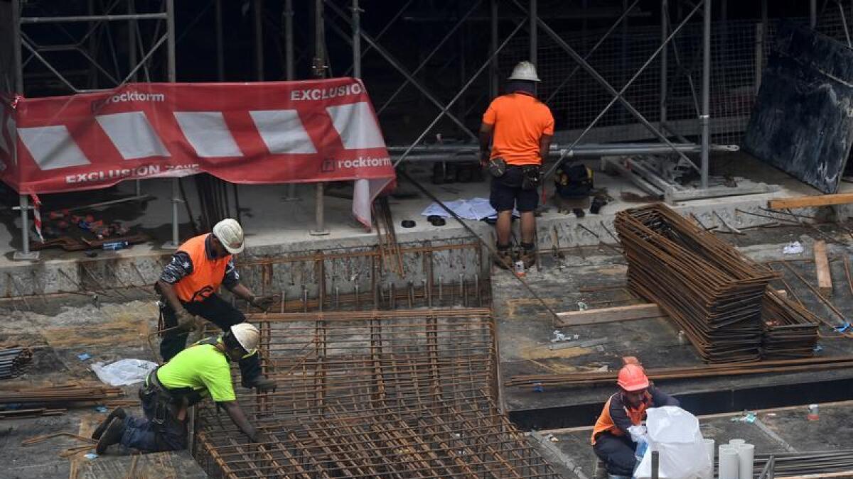 Workers on a construction site in Sydney.