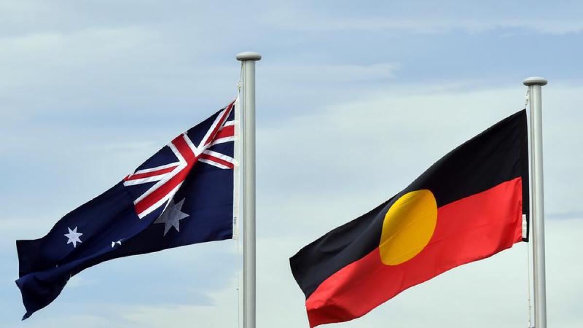 The Australian and Aboriginal flags flying side by side.