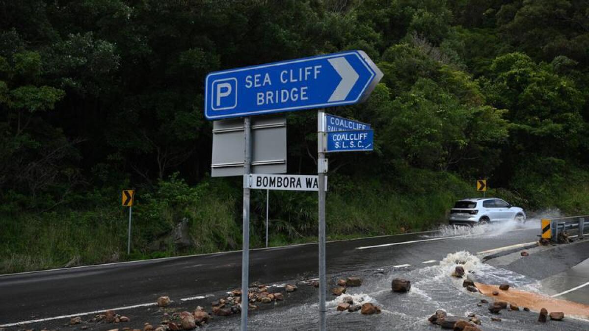 Damage caused by flash flooding and landslides north of Wollongong.