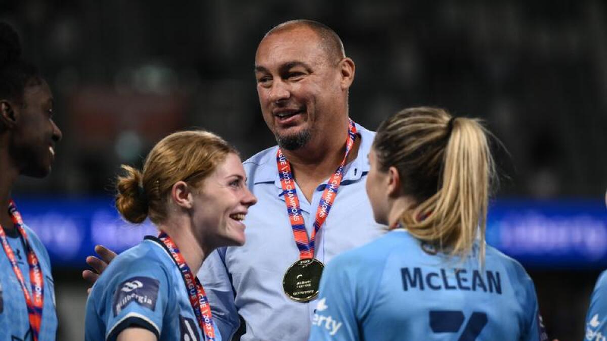 Courtnee Vine (left), coach Ante Juric and Charlotte McLean