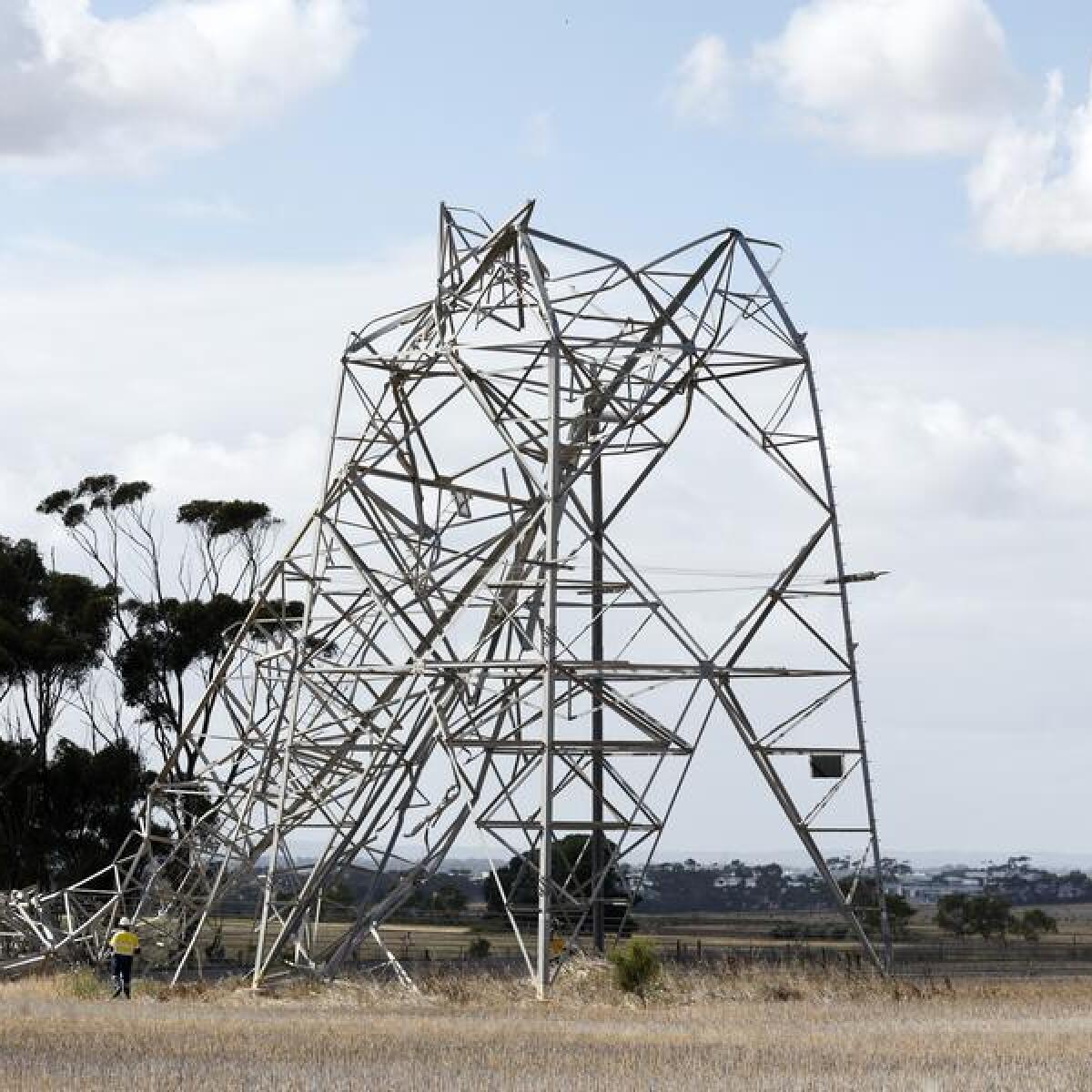 A transmission tower damaged in the storms two weeks ago.