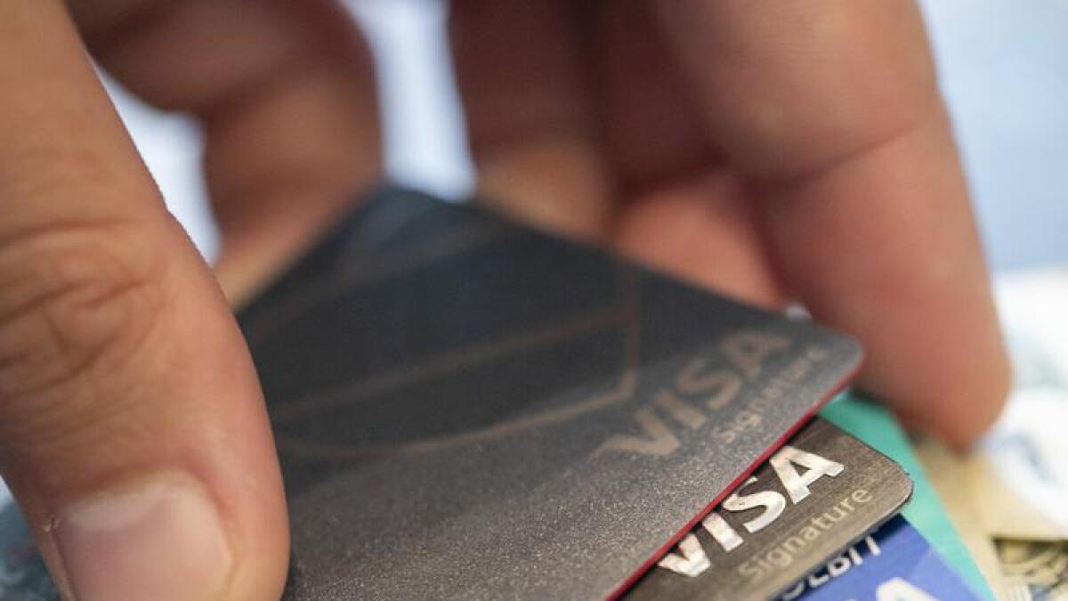Visa's profits are up by almost a third.