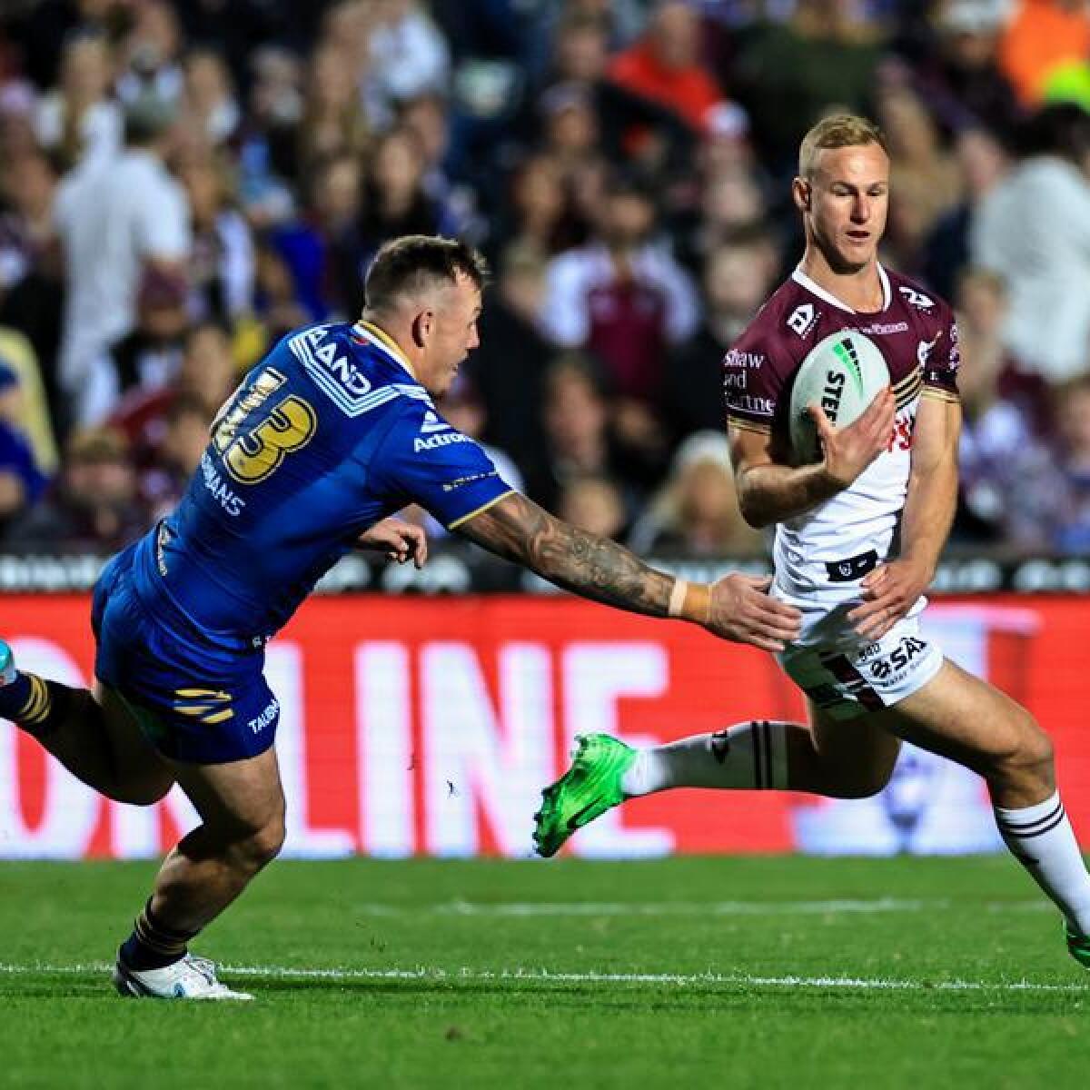 Manly's Daly Cherry-Evans runs with the ball against the Eels. 