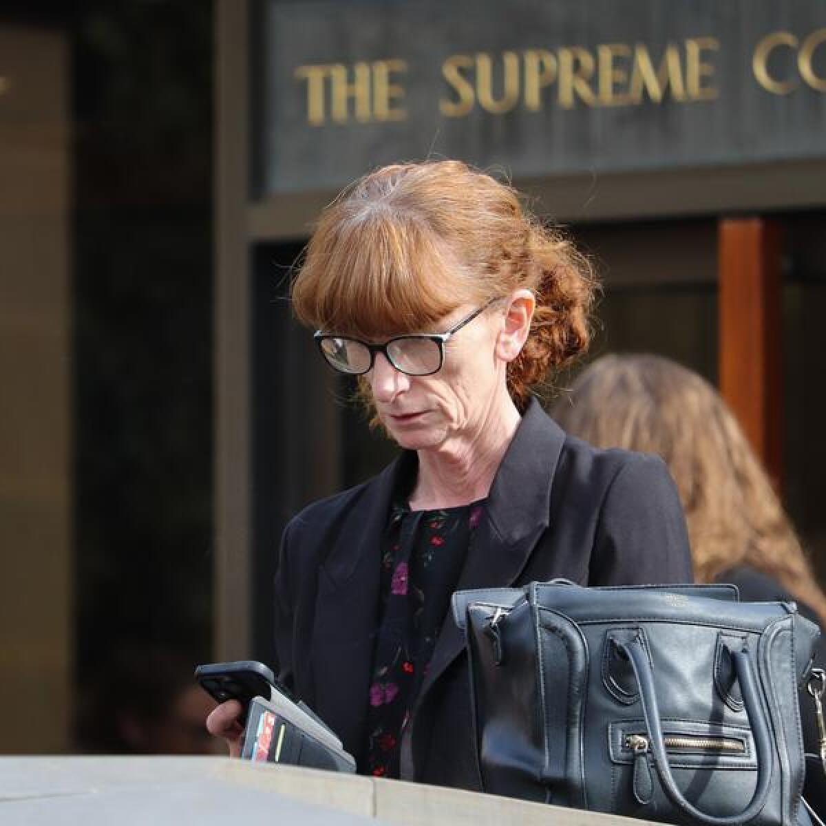Lisa Anne Perryman leaves the Supreme Court