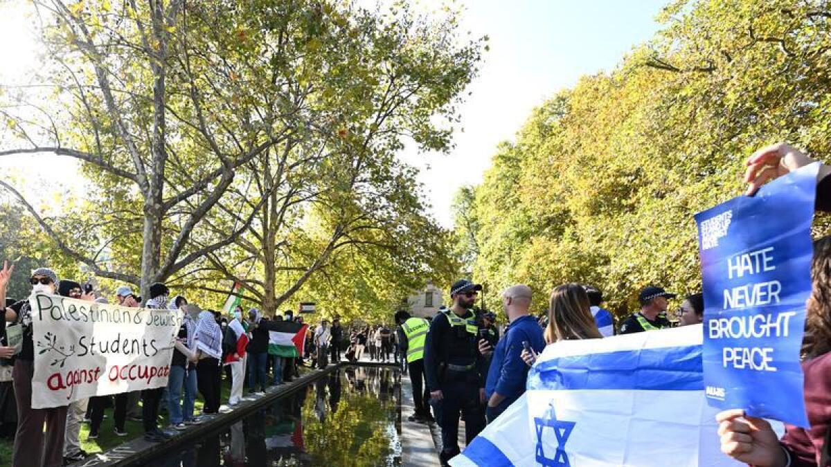Jewish community members opposite a Pro-Palestine encampment
