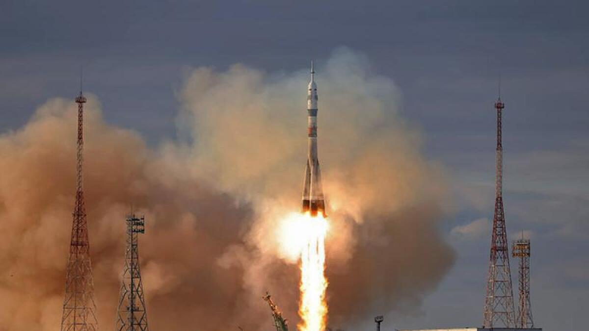 A Soyuz spacecraft takes off.