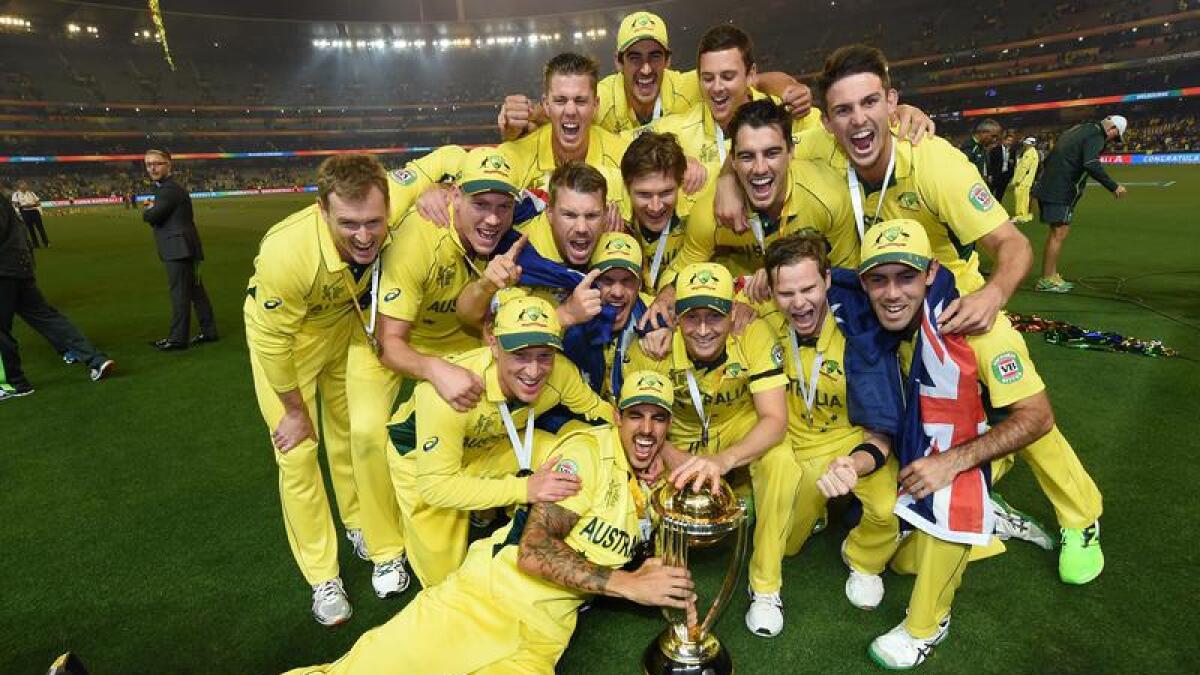 Australia players celebrate their 2015 cricket world cup win.