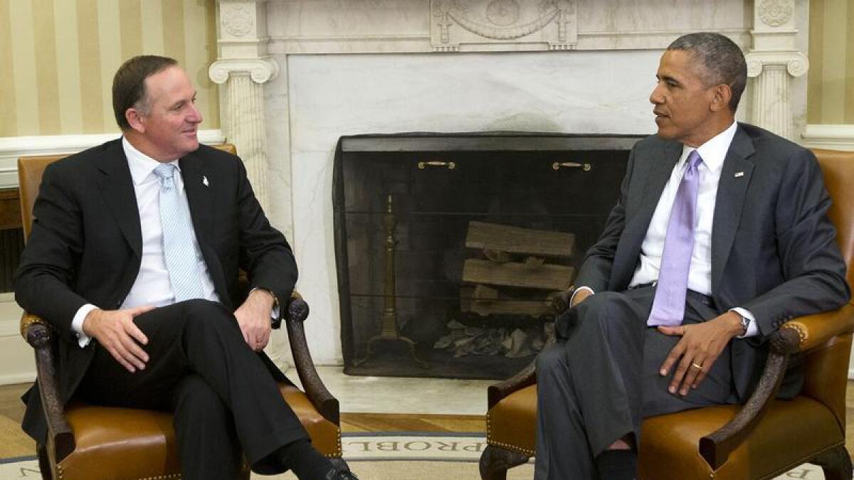 Then NZ Prime Minister Sir John Key with Barack Obama in 2014.