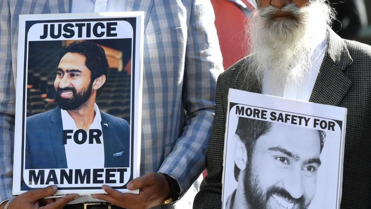 Family and friends of Manmeet Sharma rally outside court (file image)