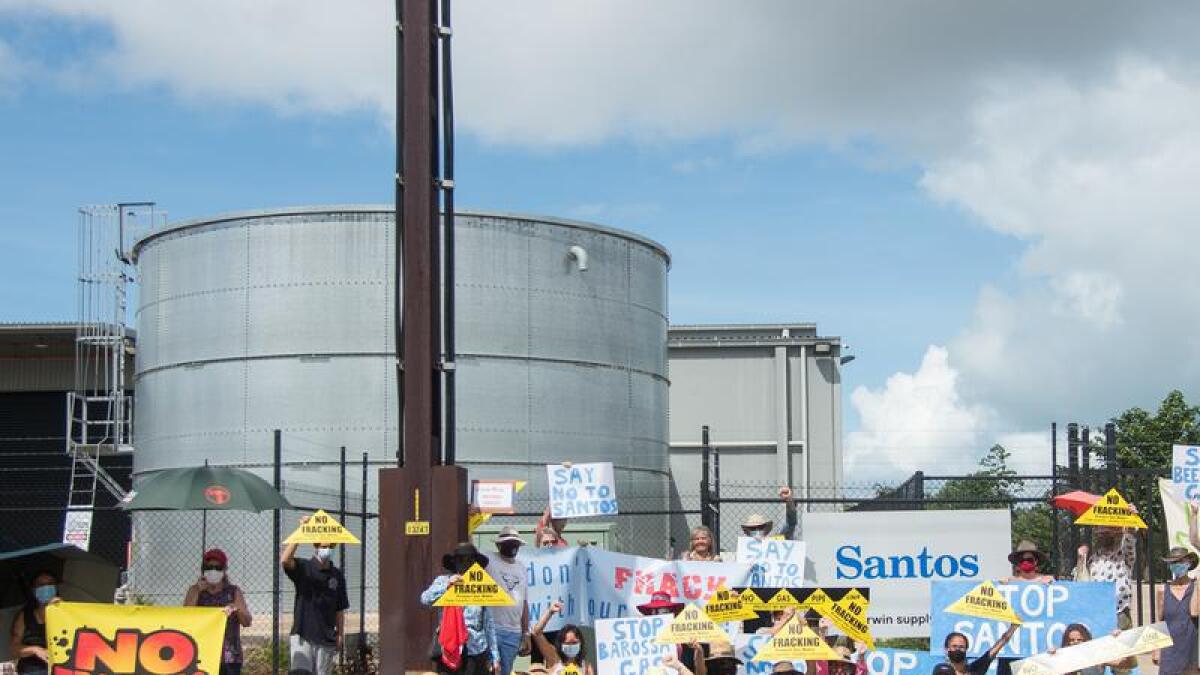 Protesters gathered outside Santos's Darwin premises