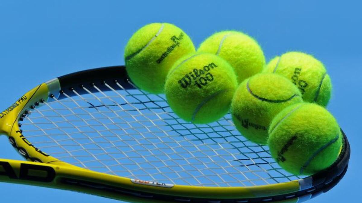 Tennis balls on a racquet (file image)
