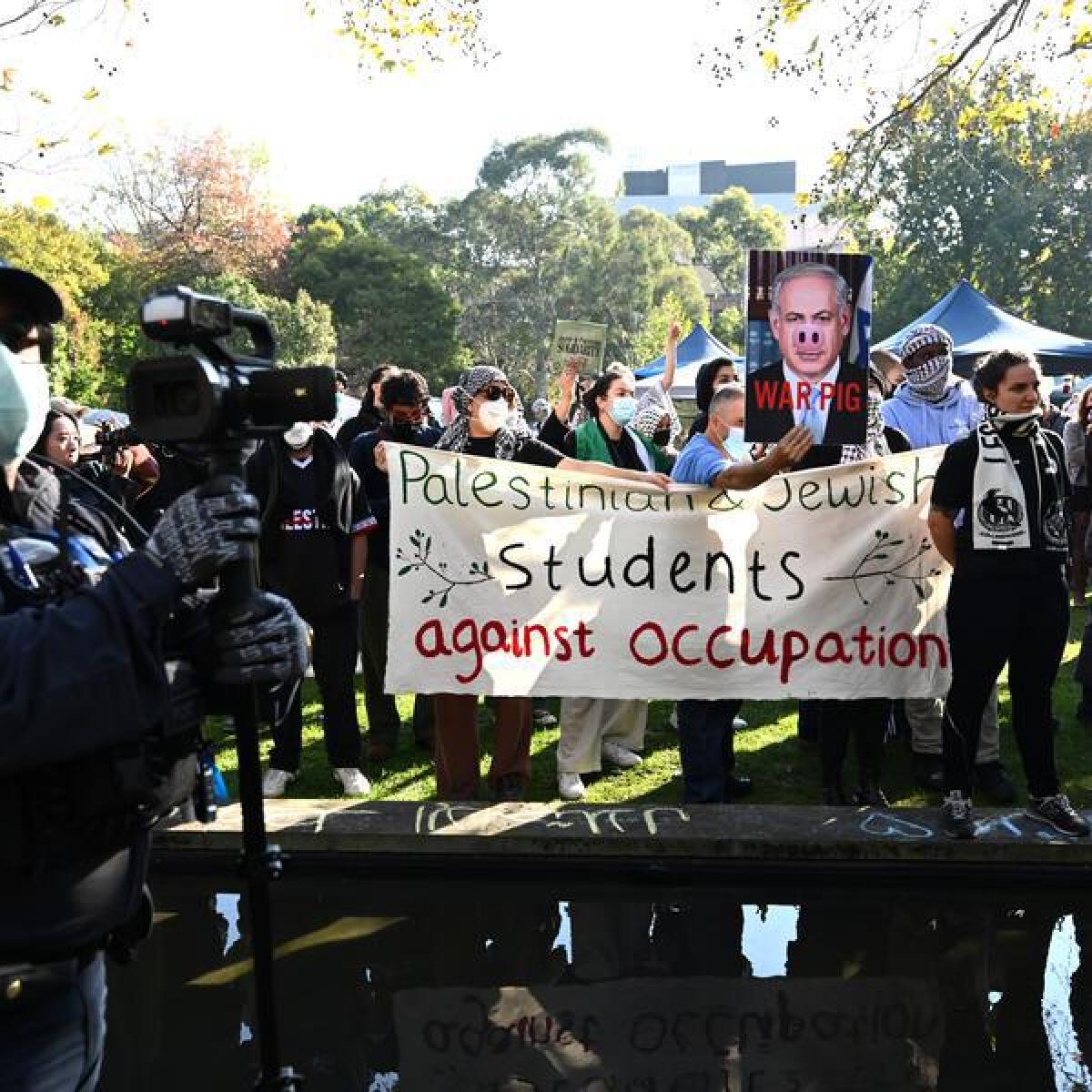 Members of a Pro-Palestine encampment at the University of Melbourne