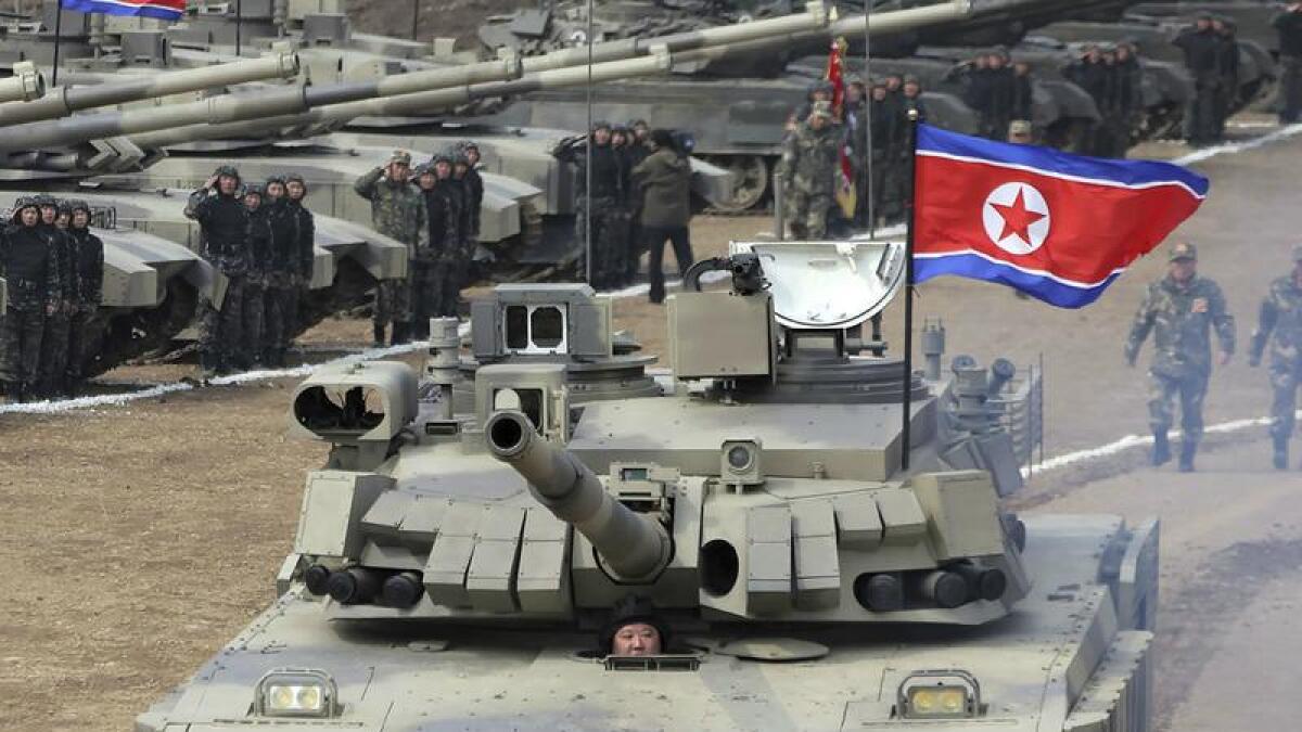 North Korean leader Kim Jong-un driving a tank