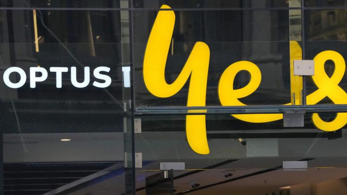 An Optus phone sign hangs above its store in Sydney