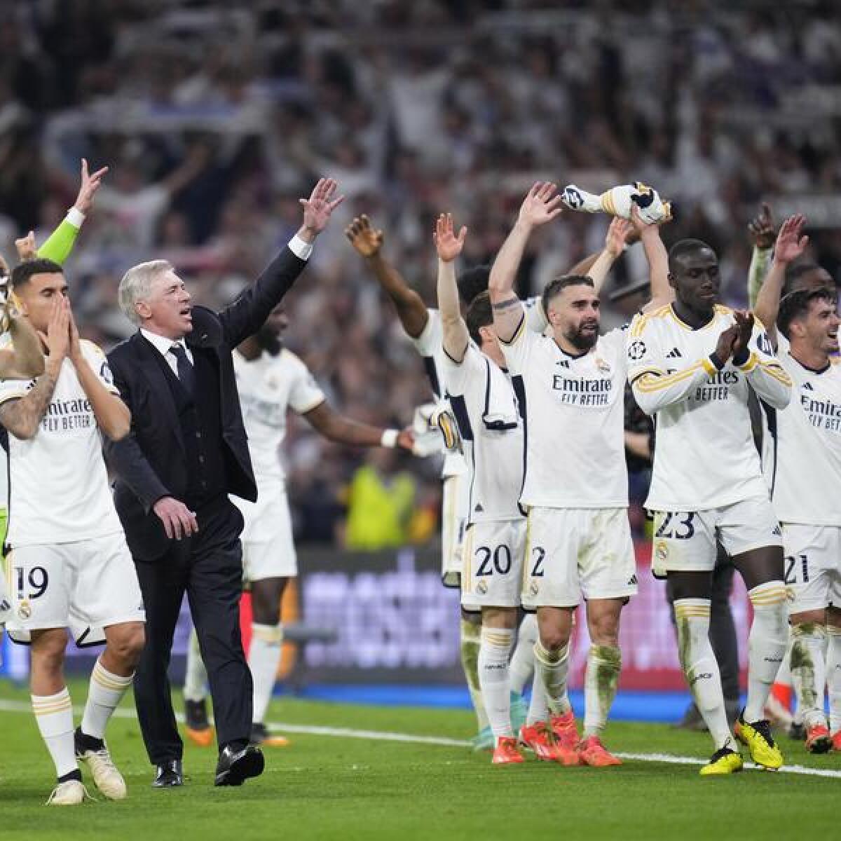 Real Madrid players and coach Carlo Ancelotti.
