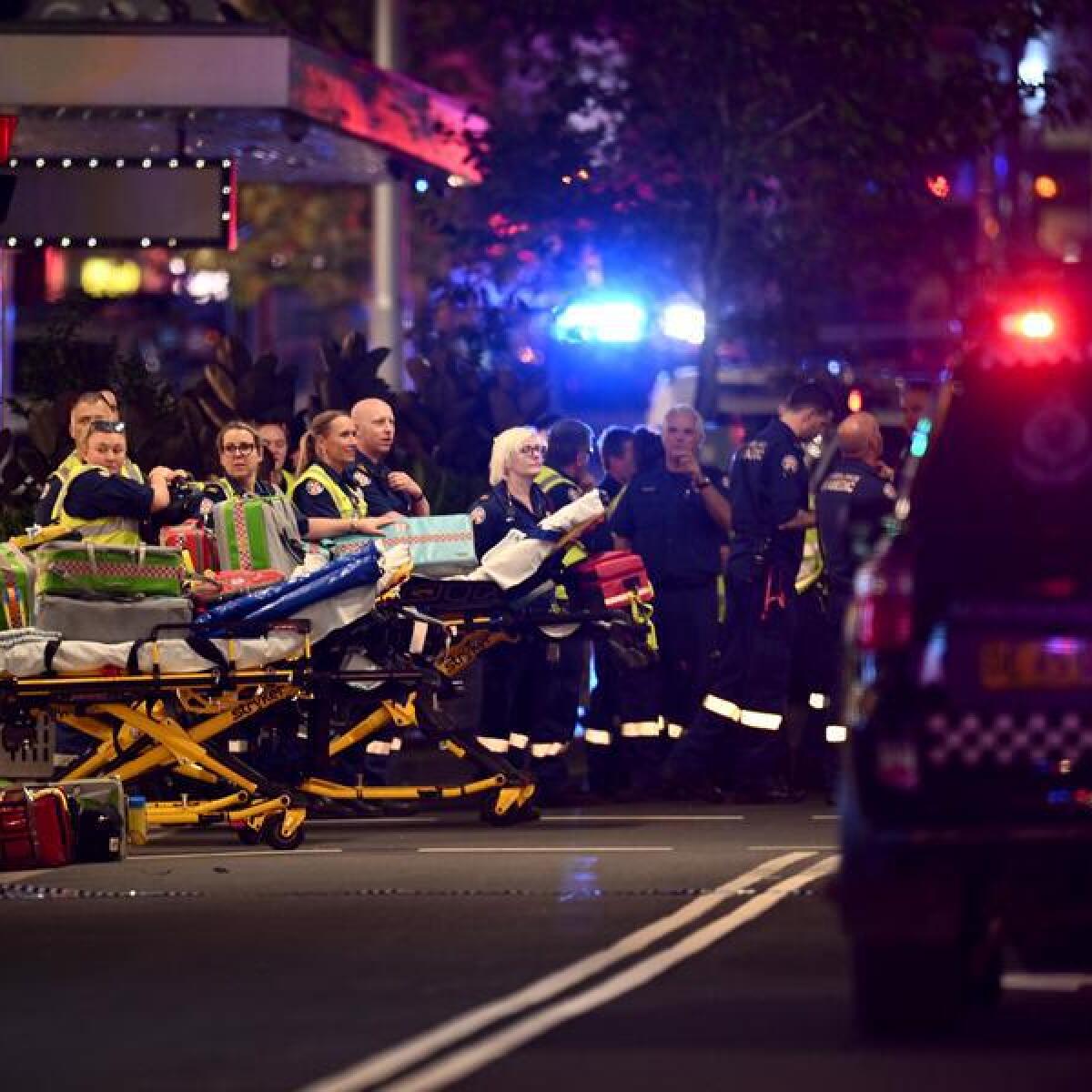 Police and paramedics treat patients at Westfield Bondi Junction