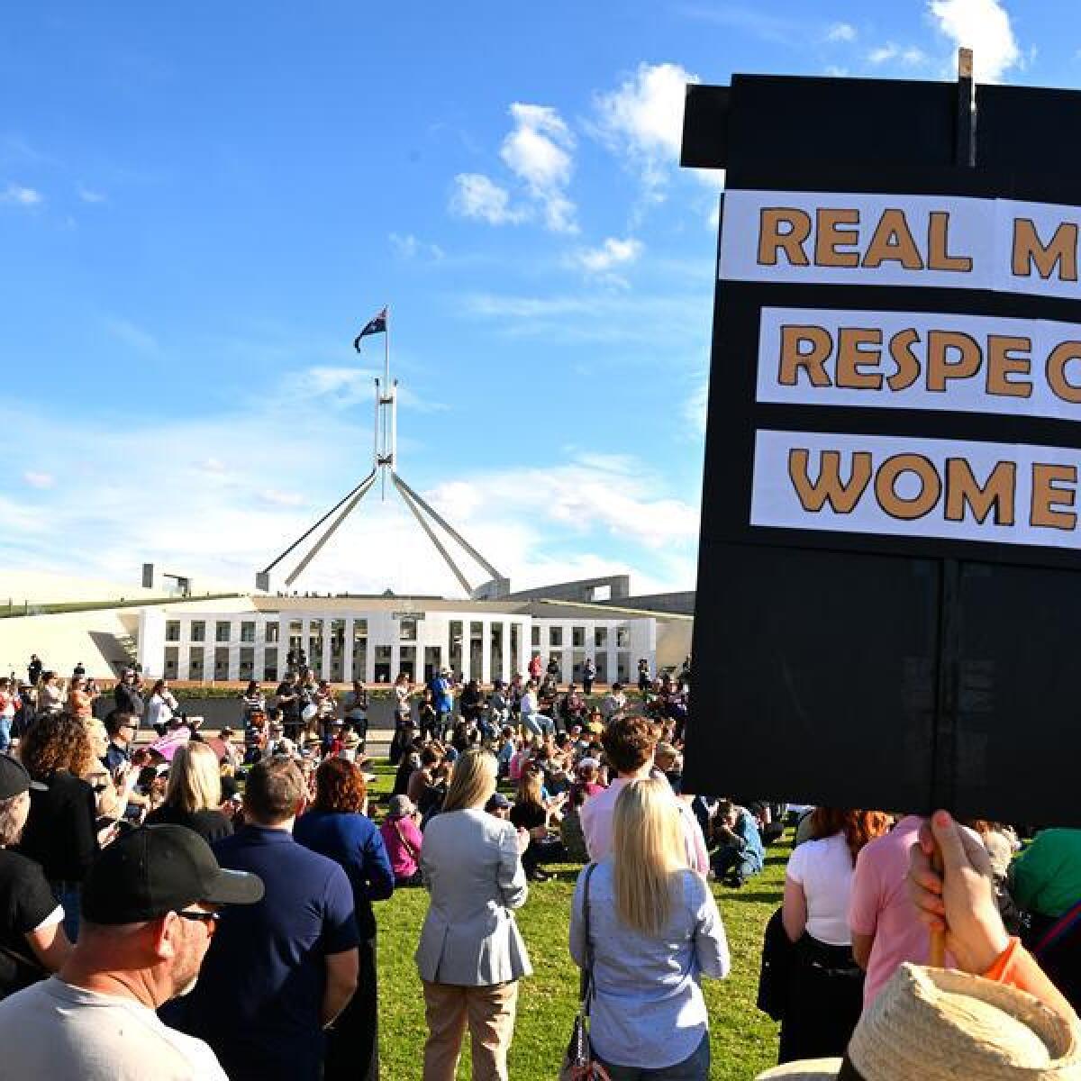 People at a rally to a call for action to end violence against women