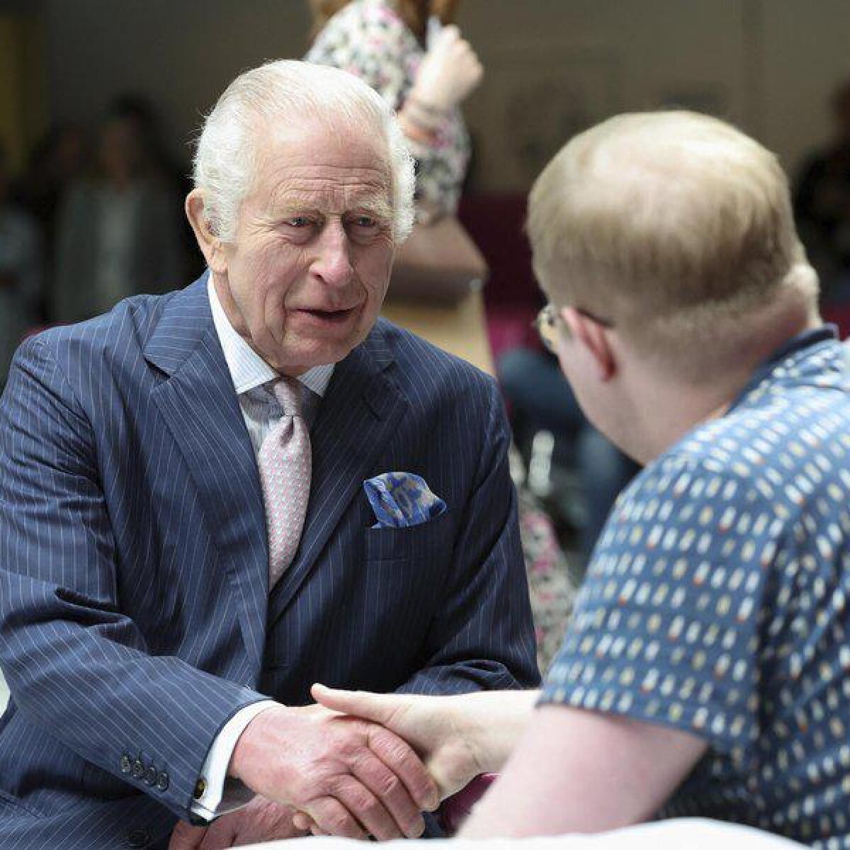 Britain's King Charles meets with a cancer patient