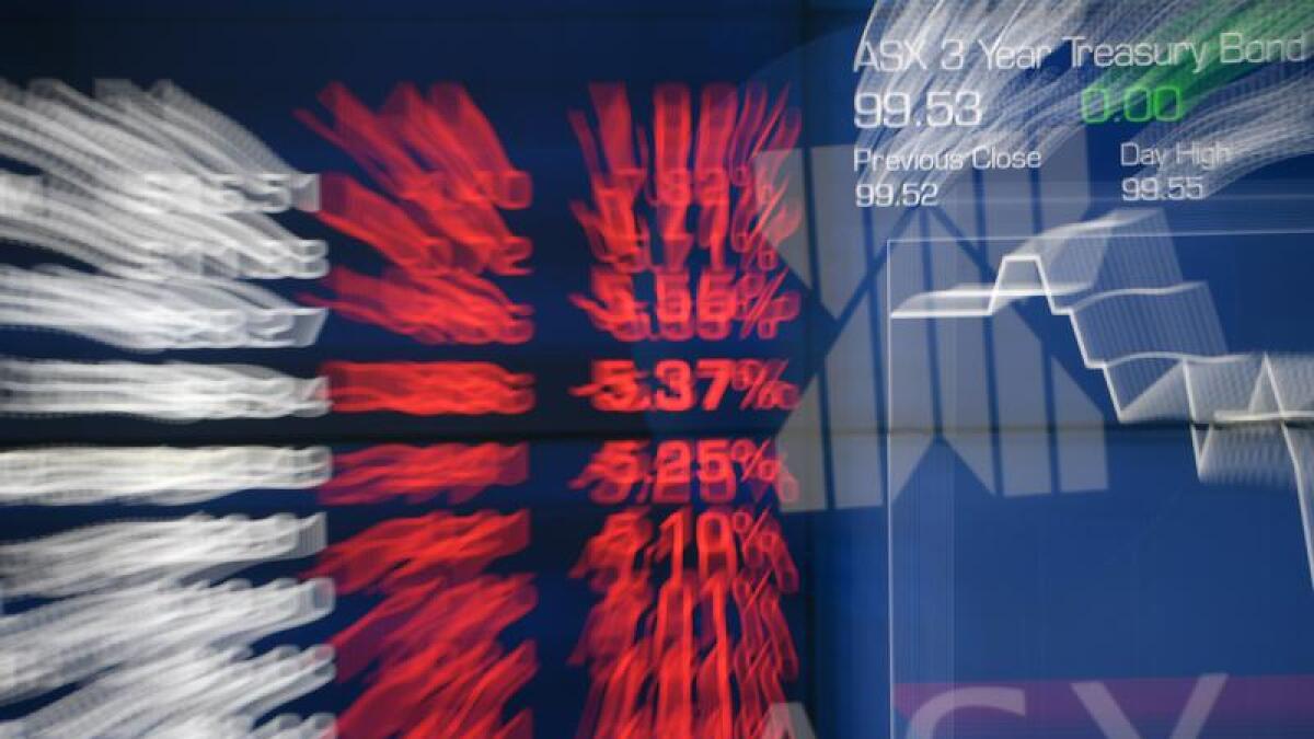 Blurred image of an ASX trading display.