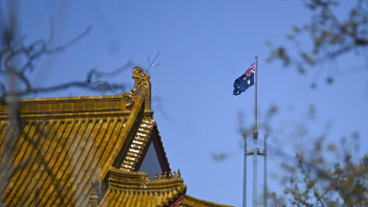 The Australian flag flies above the Chinese embassy in Canberra.
