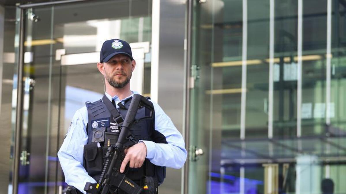 An Australian Federal Police officer outside Canberra Airport