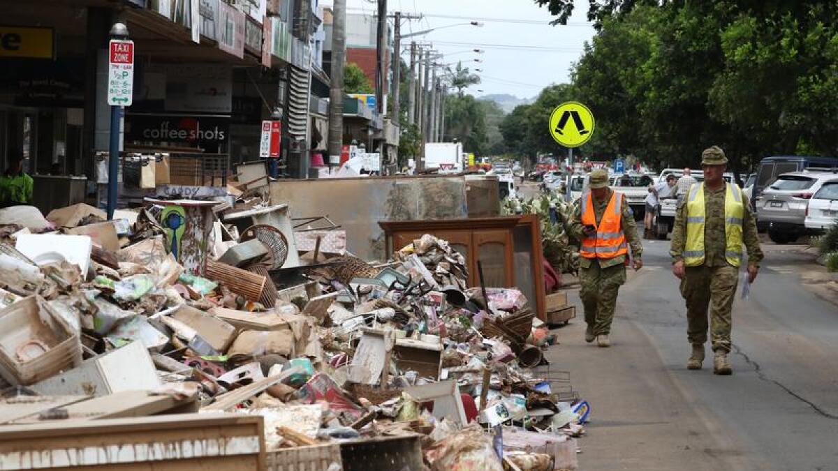 ADF personnel assist with flood clean-up in Lismore.