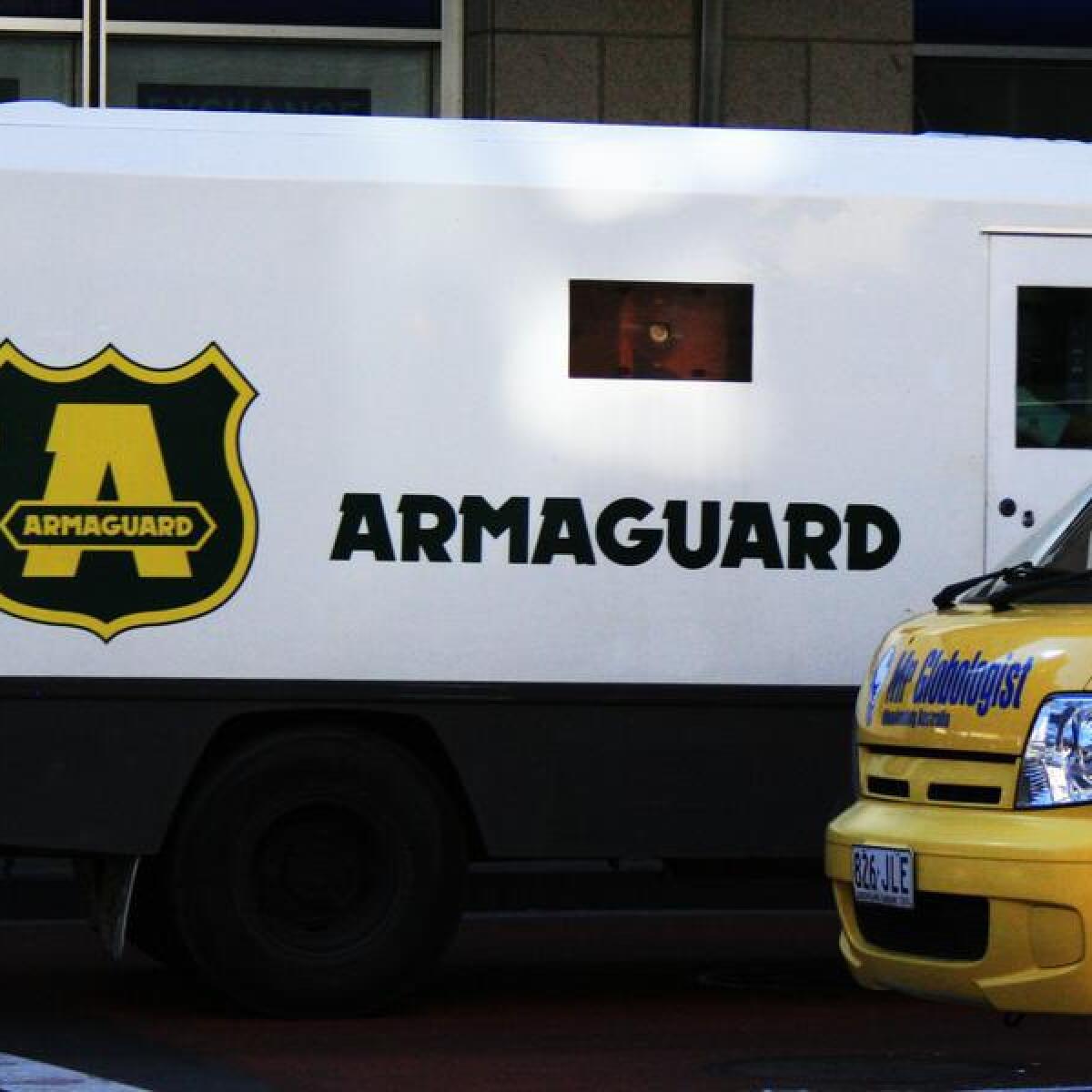 An Armaguard truck travels through Sydney.