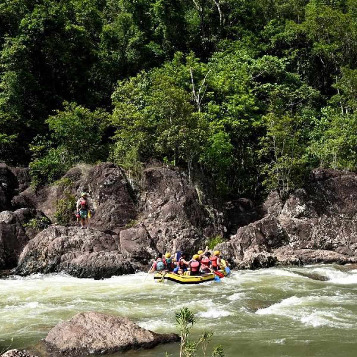 Tourists white water rafting on the Tully River in North Queensland