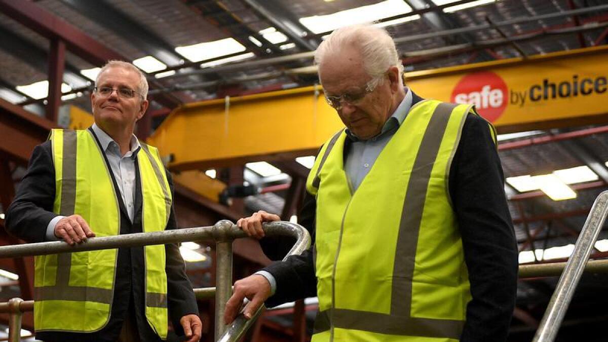 Scott Morrison (left) visits the Crossmuller factory in Somersby, NSW.