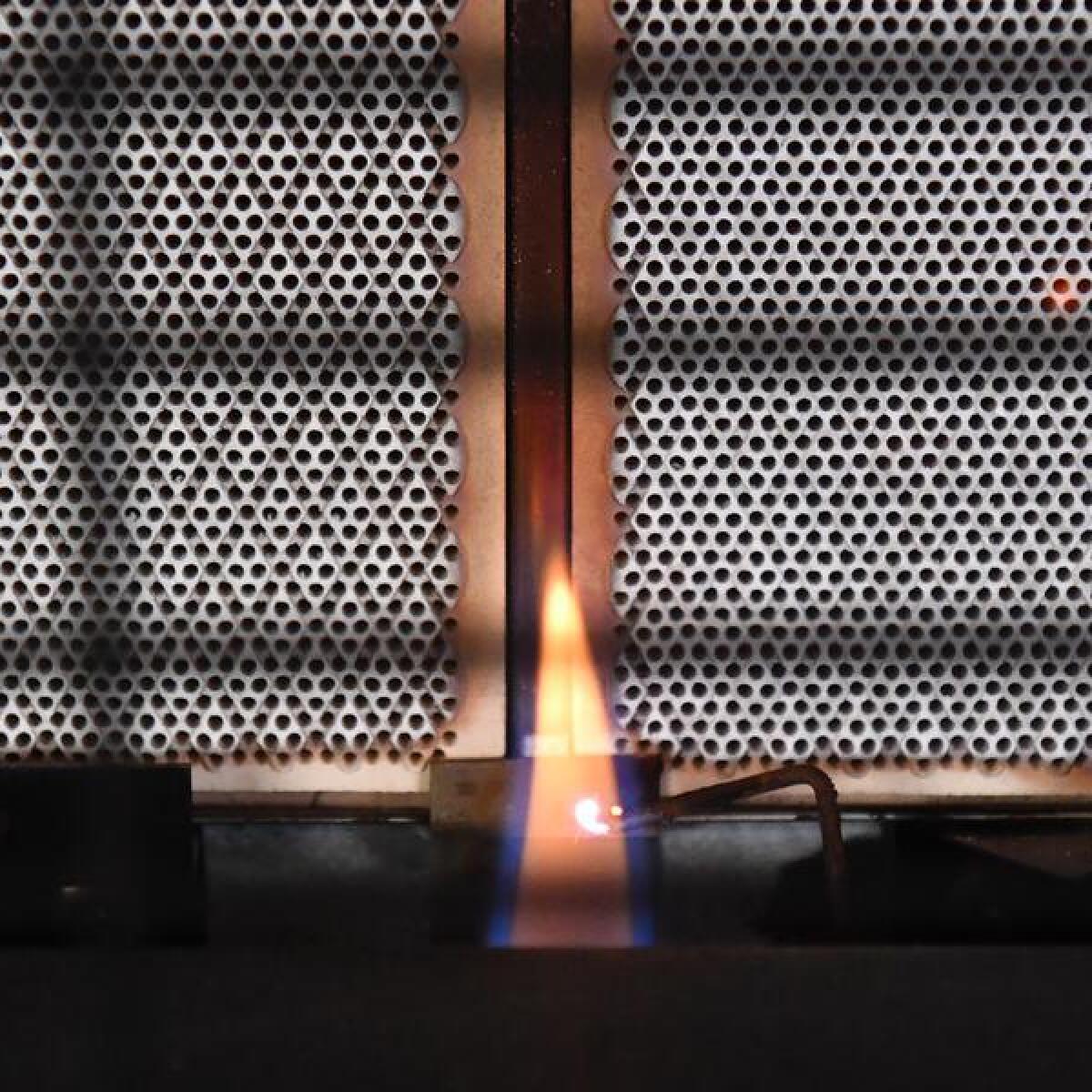 A gas heater is lit in a lounge room in Sydney (file image)