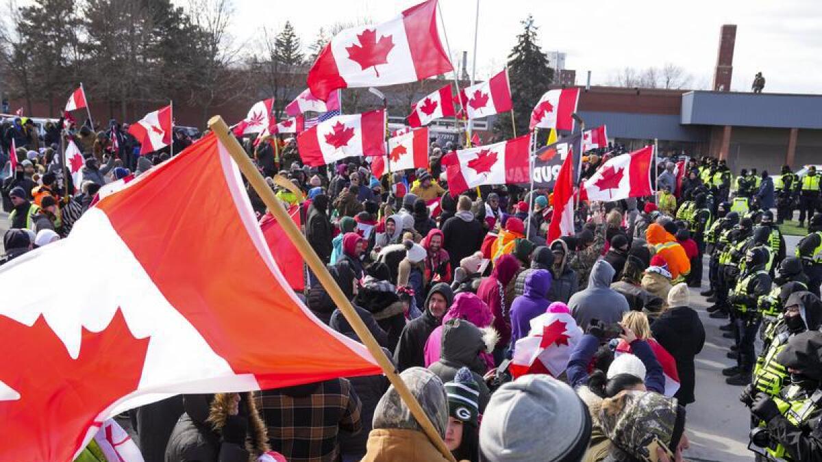 Protesters and police in Windsor, Ontario