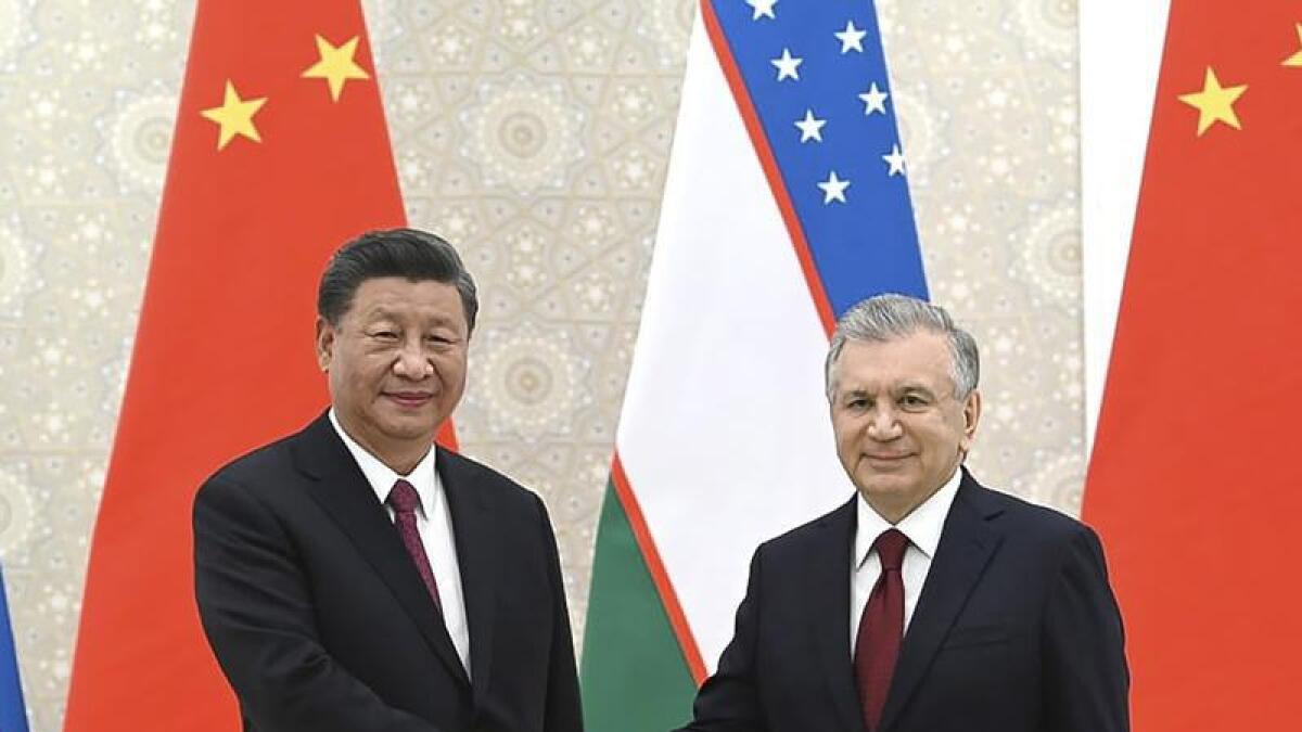 Chinese President Xi Jinping and Uzbek President Shavkat Mirziyoyev.
